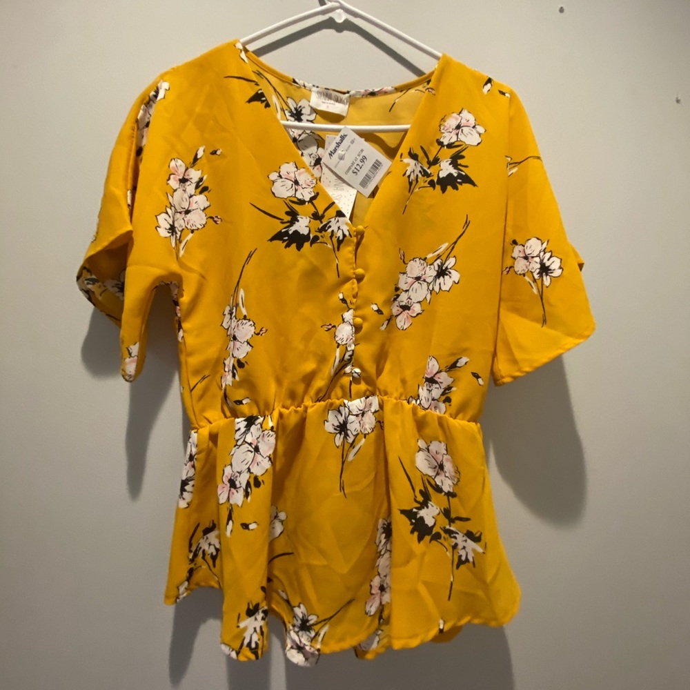 Woman’s yellow top